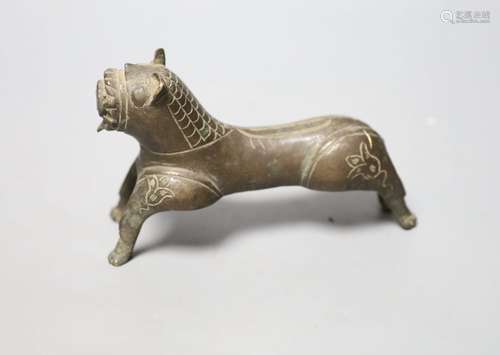 A Persian bronze tiger figure with incised detail, 16cm