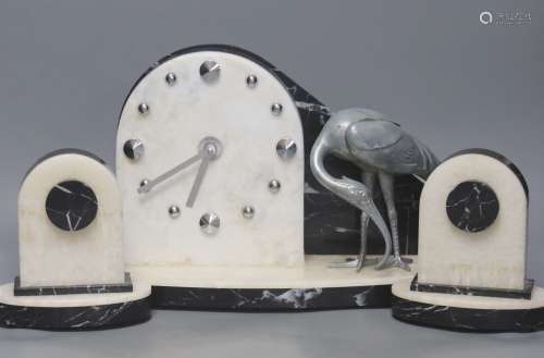 An Art Deco clock garniture, with stork surmount, clock widt...