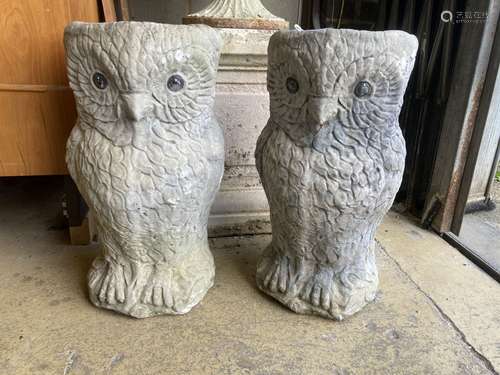 A pair of reconstituted stone owl garden planters, height 50...