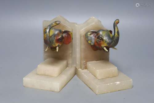 A pair of 1930's alabaster book ends, each applied with a pa...