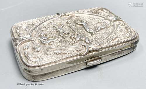 A late Victorian embossed silver shaped rectangular cigarett...