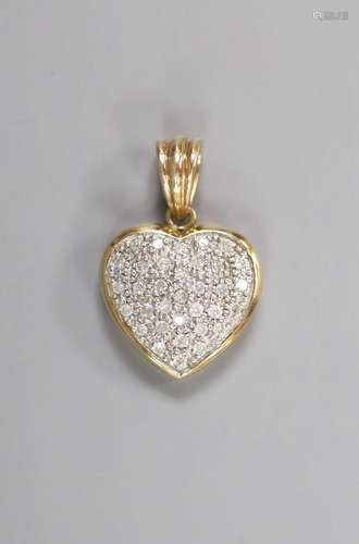 A modern 9k and pave set diamond chip heart pendant, overall...