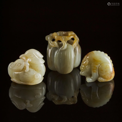 A Group of Three White and Celadon Jade Carvings,