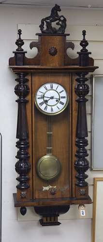 A 19th century Continental regulator in architectural walnut...