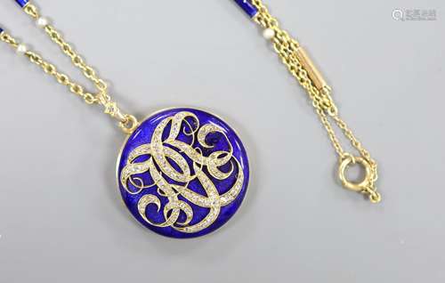 A yellow metal, blue enamel and rose cut diamond set monogra...