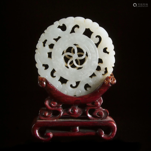 A White Jade Reticulated Circular Plaque, Qing Dynasty,
