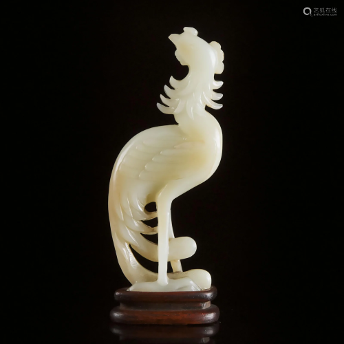 A White Jade Carved Phoenix, 19th/20th Century, ??