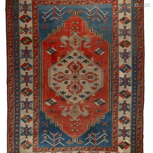 AN ORIENTAL CARPET