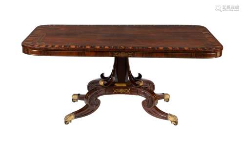 Y A rosewood and inlaid breakfast table