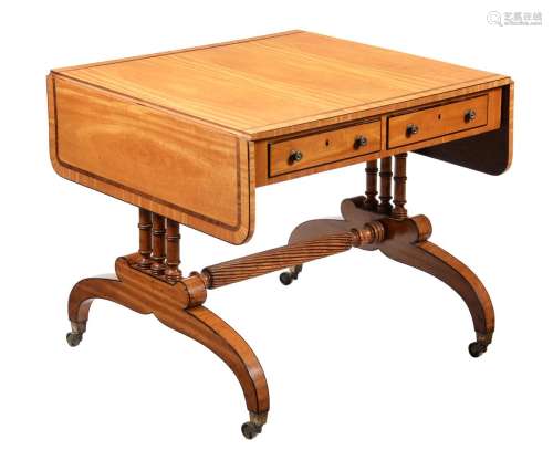 A Regency satinwood and inlaid sofa table