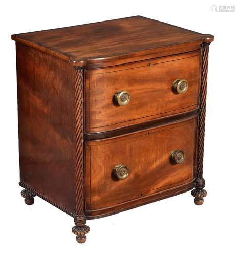 A mahogany bedside cupboard