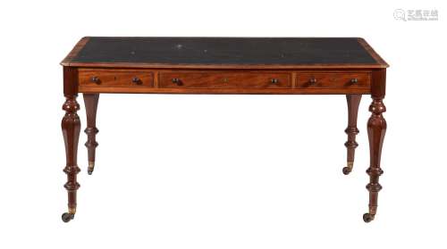 A Victorian mahogany writing table