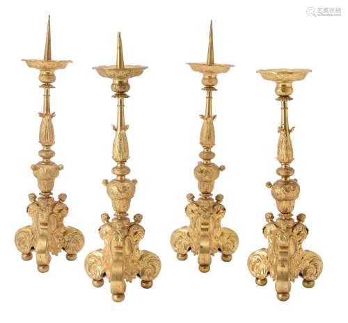 A set of four pricket candlesticks in Continental Baroque ta...