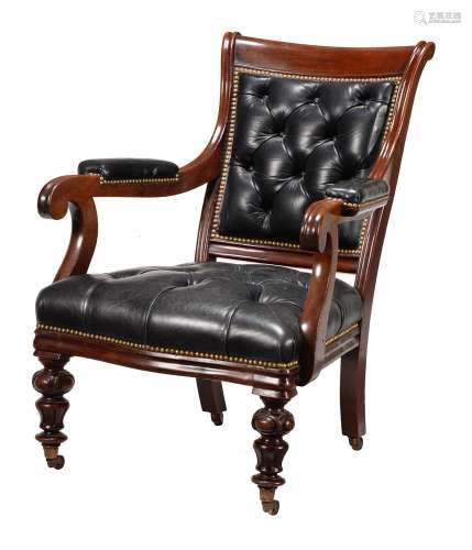 A Victorian mahogany and black leather upholstered library a...