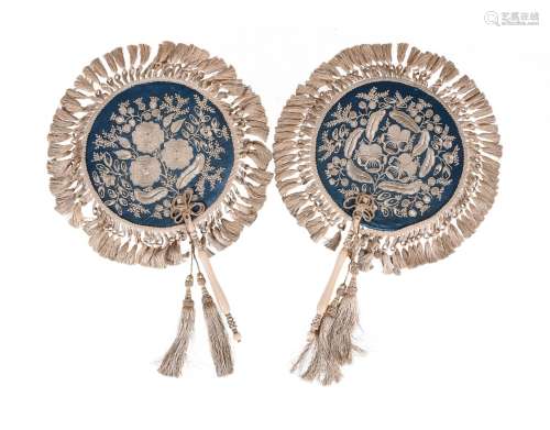 Y A pair of ivory hand fans