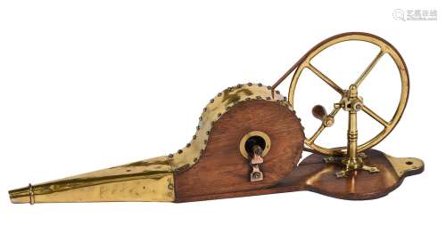 An oak and brass mounted mechanical bellows