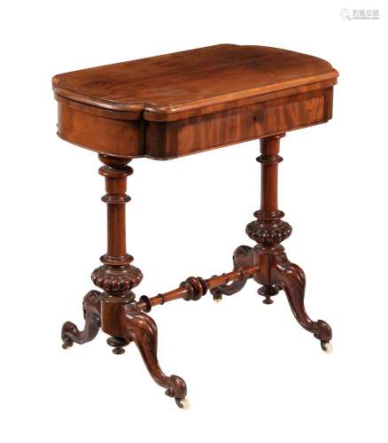 A Victorian mahogany games table