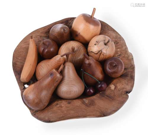 A collection of twelve pieces of turned wood fruit