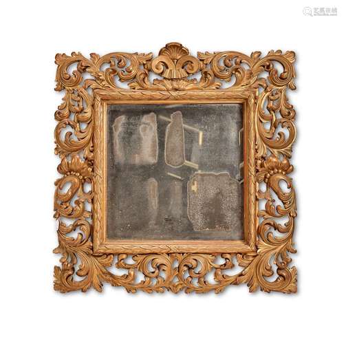 An Italian carved giltwood wall mirror