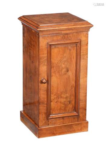 A Victorian figured walnut pedestal cupboard