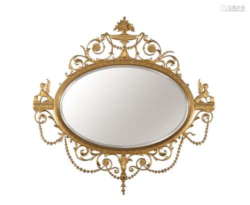 A giltwood and composition oval wall mirror