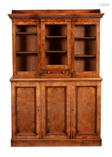 A Victorian walnut cabinet bookcase