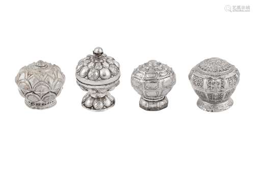 Four mid-20th century Thai unmarked silver lime boxes
