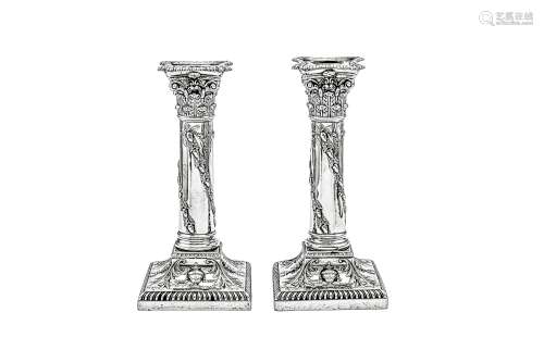 A pair of Victorian sterling silver candlesticks, London 189...