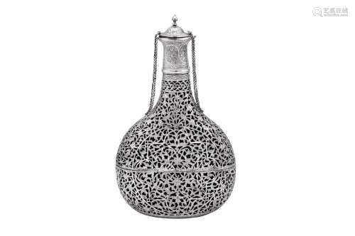 An early 20th century Iranian (Persian) silver cased bottle,...