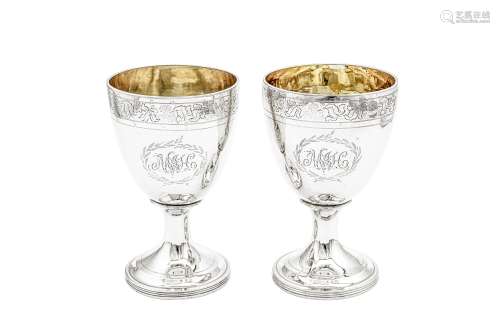 A pair of George III provincial sterling silver goblets, New...