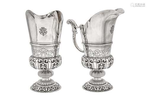 A pair of early 20th century French 950 standard silver ewer...