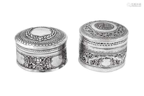 Two mid- 20th century Burmese unmarked silver betel boxes or...