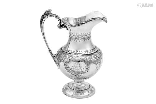 A Victorian sterling silver milk jug, Birmingham 1870 by Hor...