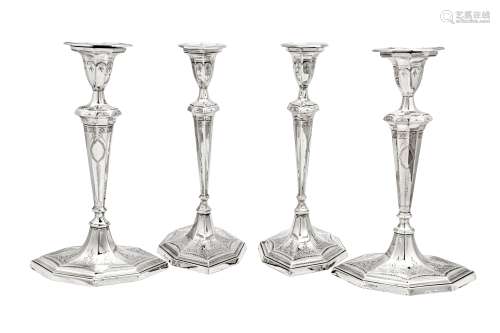 A set of four George III sterling silver candlesticks, Sheff...