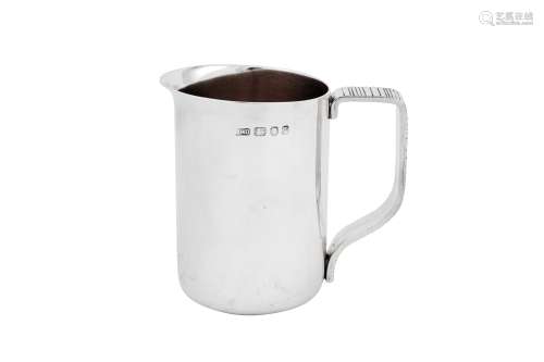 A heavy Elizabeth II Modernist sterling silver milk jug, Lon...