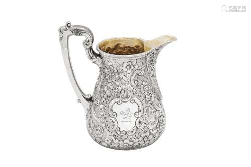 A Victorian sterling silver milk jug, London 1856 by Edward ...