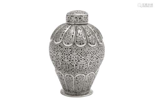A late 19th century Anglo-Indian unmarked silver tea caddy, ...