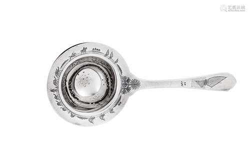 An early 20th century Iraqi silver and niello tea strainer, ...