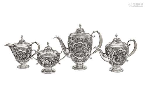 A mid-20th century Iranian (Persian) silver four-piece tea a...