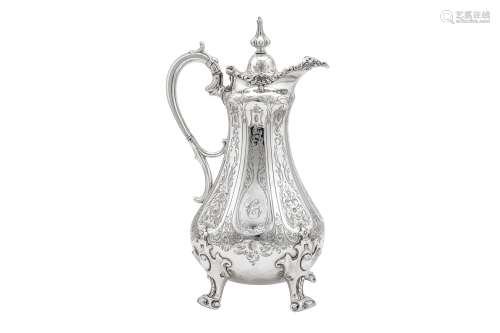 An unusual Victorian sterling silver wine ewer or claret jug...