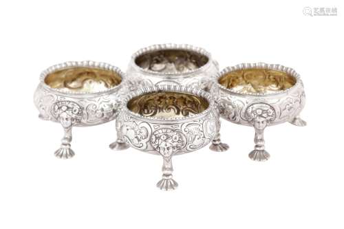 A set of four George II sterling silver salts, London 1745 b...