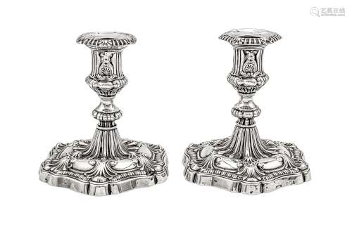 A pair of George III sterling silver dwarf candlesticks, She...