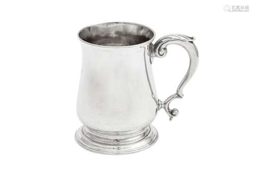 A George II sterling silver half pint mug, London 1753 by Ri...