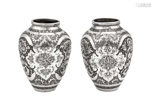 A pair of mid-20th century Iranian (Persian) silver vases, I...
