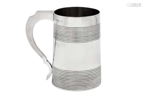 A George III sterling silver quart (two pint) mug, London 17...