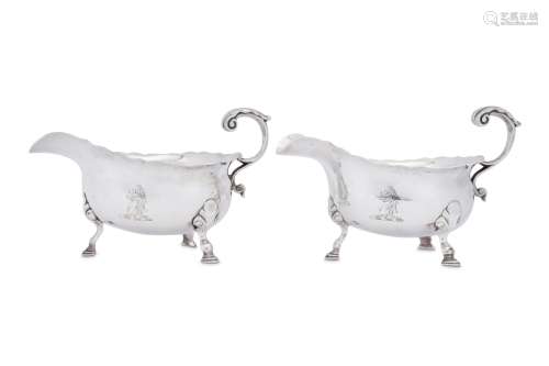 A pair of George II sterling silver sauceboats, London 1747 ...
