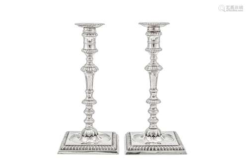 A pair of George II sterling silver candlesticks, London 175...