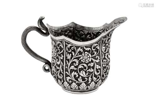 A late 19th century Anglo – Indian silver milk or cream jug,...