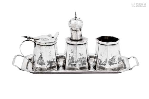 A mid-20th century Iraqi silver and niello cruet on tray, ci...