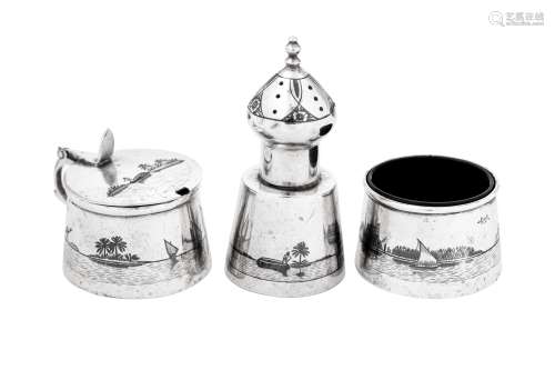 An early 20th century Iraqi silver and niello three-piece cr...
